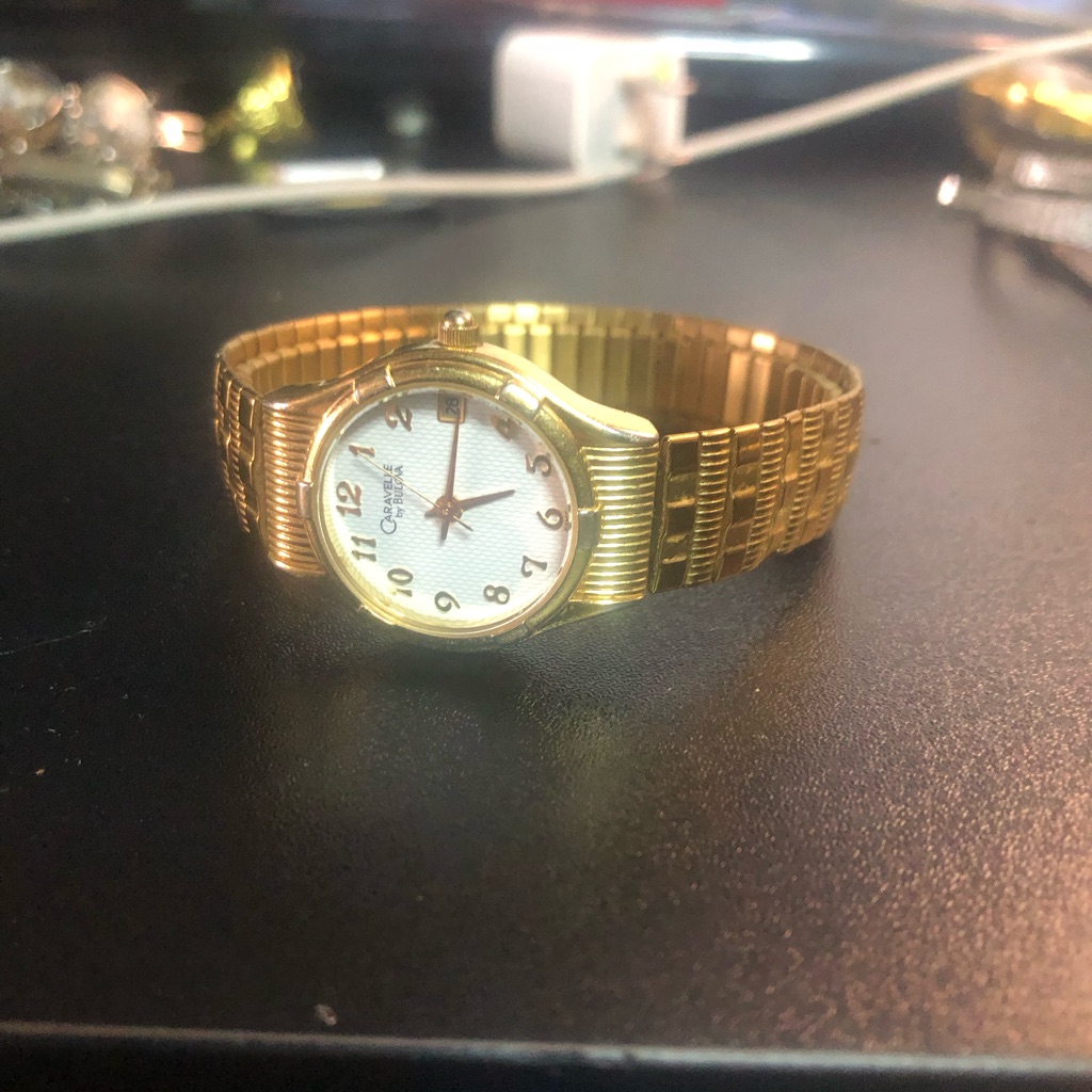 Gold Watch With White Dial